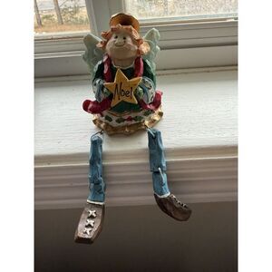 Christmas Angle Sitting On Shelf